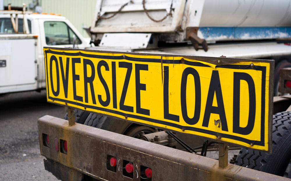 Oversize load sign on the back of a lorry